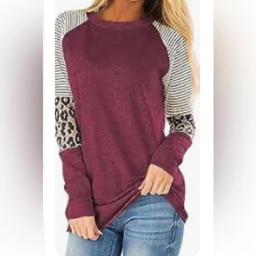 NWT leopard print color block tunic size small. Burgundy / peacock blue striped